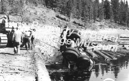 Bates, Log truck wreck in pond