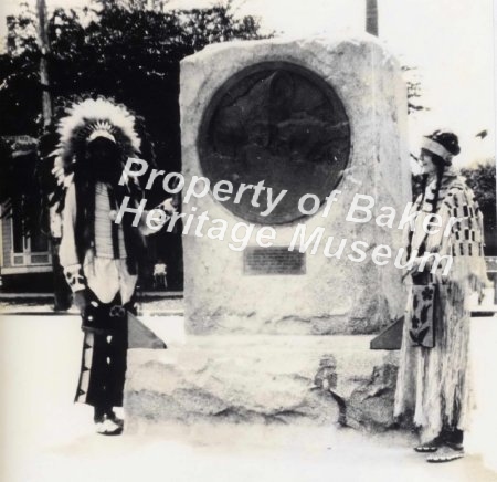 Native Americans by monument