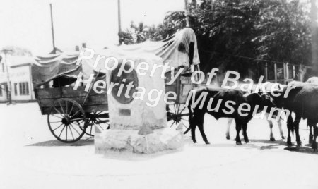 Oxen/wagon and monument