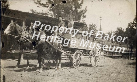 Family with wagon on Main St.