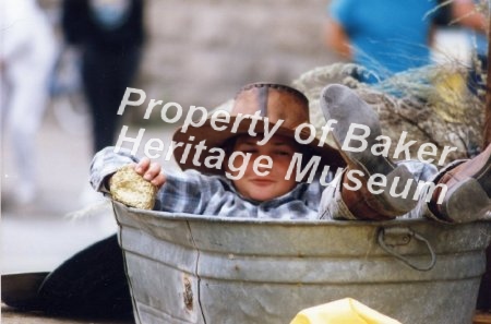 Child in wash tub, Jubilee 1989