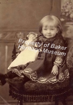 girl with doll ca. 1900