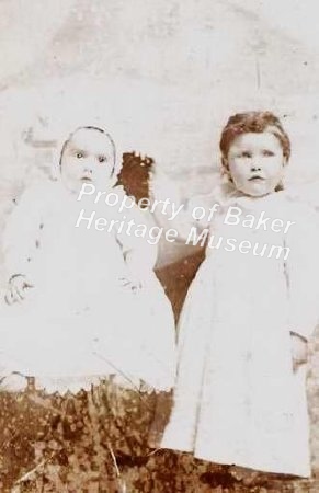 Sisters, younger in chair