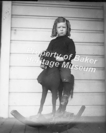 girl with rocking horse