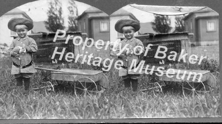 Young girl with rabbit and wagon