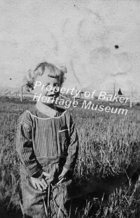 boy in hayfield