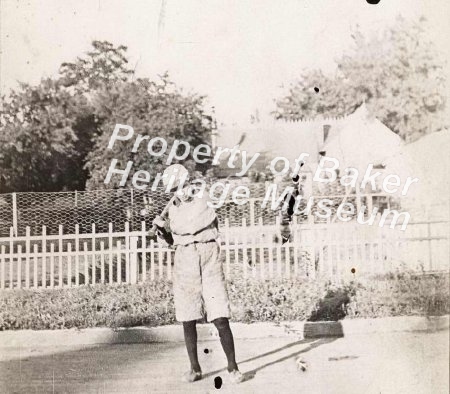 boy in baseball uniform