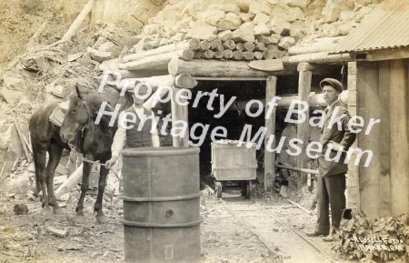 Men standing outside a mine
