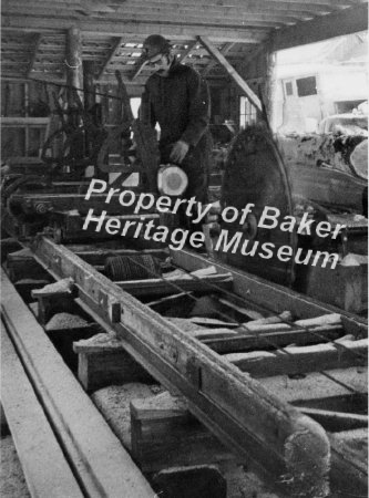 A man working in a sawmill