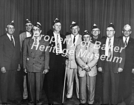 Men in front of curtain