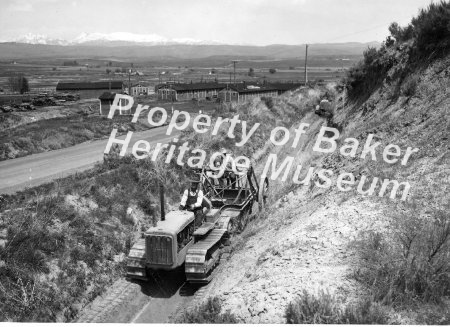 Wayne Phillips driving the Cat at the Basche Ditch above the CCC Camp.