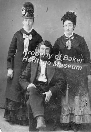 Tintype of man and two women.