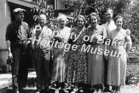 Group in front of bush