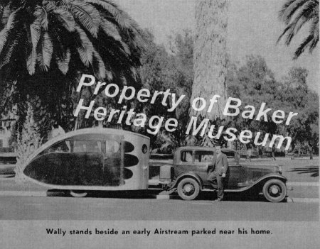 Wally Byam beside an early Airstream