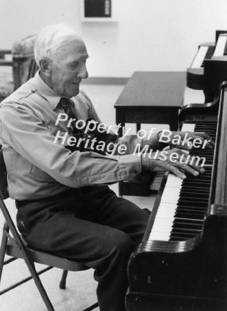 Elderly Man playing piano