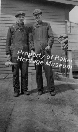 Two men in overalls