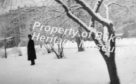 Man in overcoat in snow