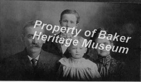 Wallace Byam with his cousin Ernestine Biswell with their Grandparents Jame