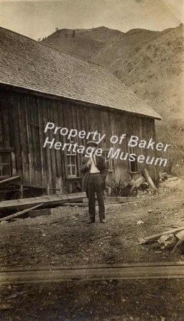 a man standing outside a build