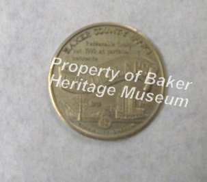 $2 Baker City Bucks Coin